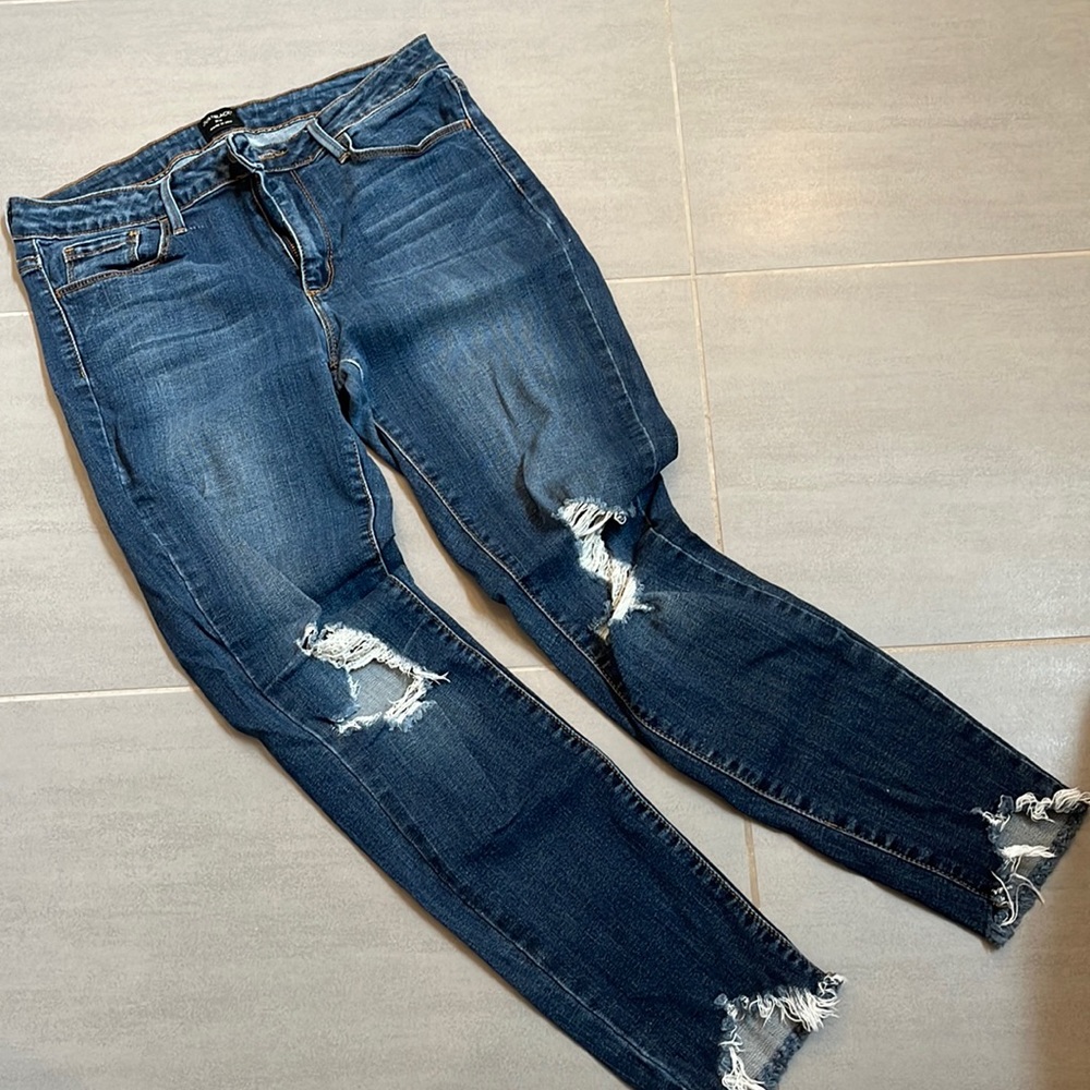JUST BLACK. Brand ripped jeans lightly worn. Stretchy denim.